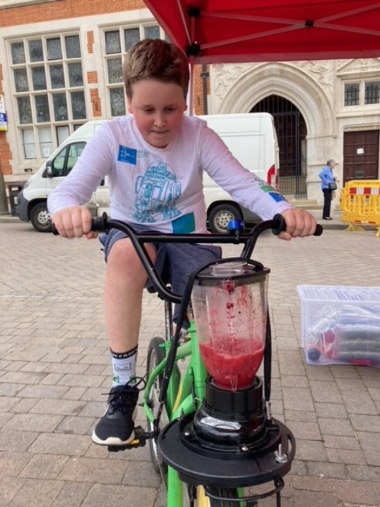 Boy on smoothie bike